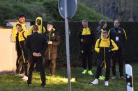 <p>Borussia Dortmund players and staff are seen by the team bus after an explosion near their hotel before the game </p>