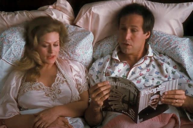 <p>Warner Bros.</p> Beverly D'Angelo and Chevy Chase in 'National Lampoon's Christmas Vacation'