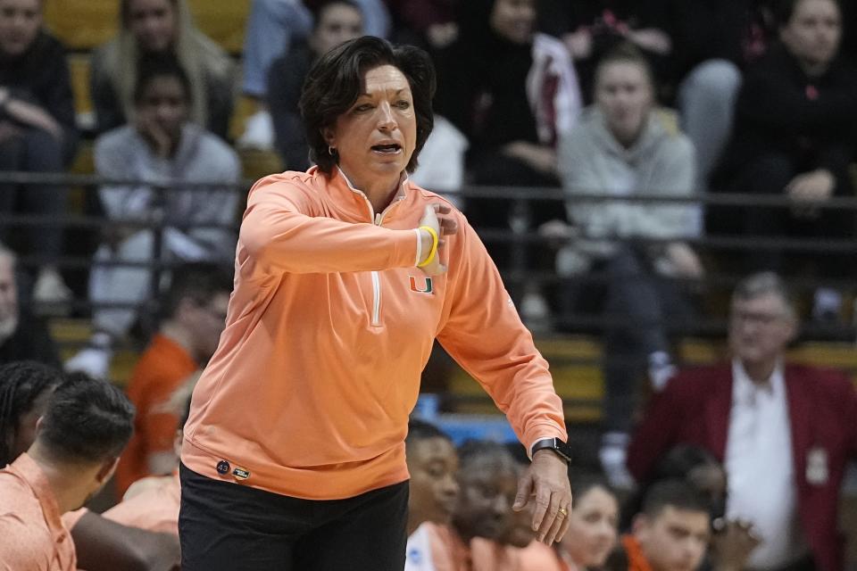 Miami head coach Katie Meier calls a play during the first half of a first-round college basketball game against Oklahoma State in the women's NCAA Tournament Saturday, March 18, 2023, in Bloomington, Ind. (AP Photo/Darron Cummings)