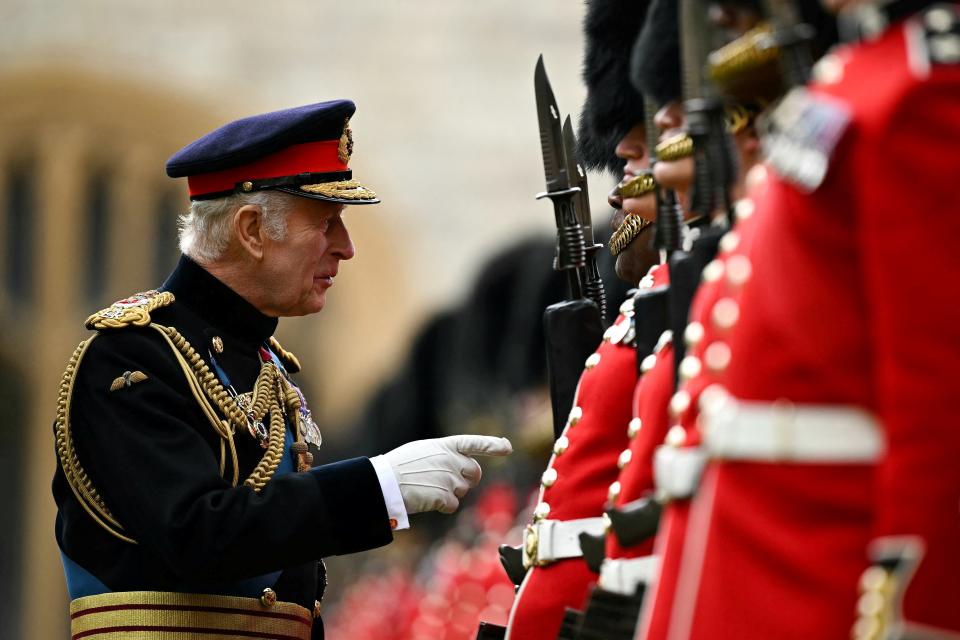 The Monarch presented the new colours in a ceremony today (via REUTERS)