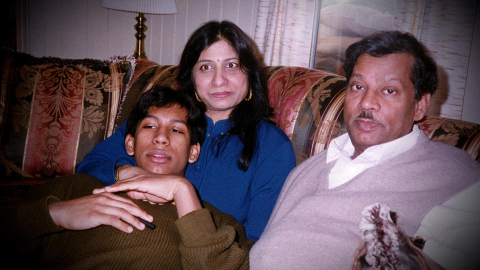 Hrishikesh Hirway and his parents. His family took on American traditions of Thanksgiving, while creating some of their own.  / Credit: CBS News