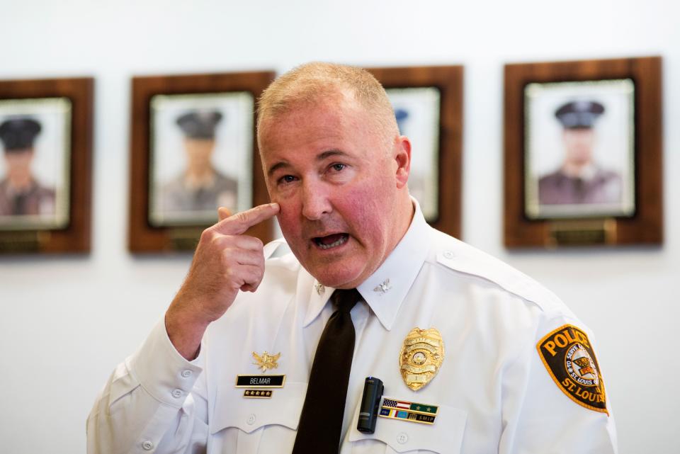 St. Louis County Police Chief Jon Belmar indicates where one of the police officers was shot. (Reuters/Kate Munsch)