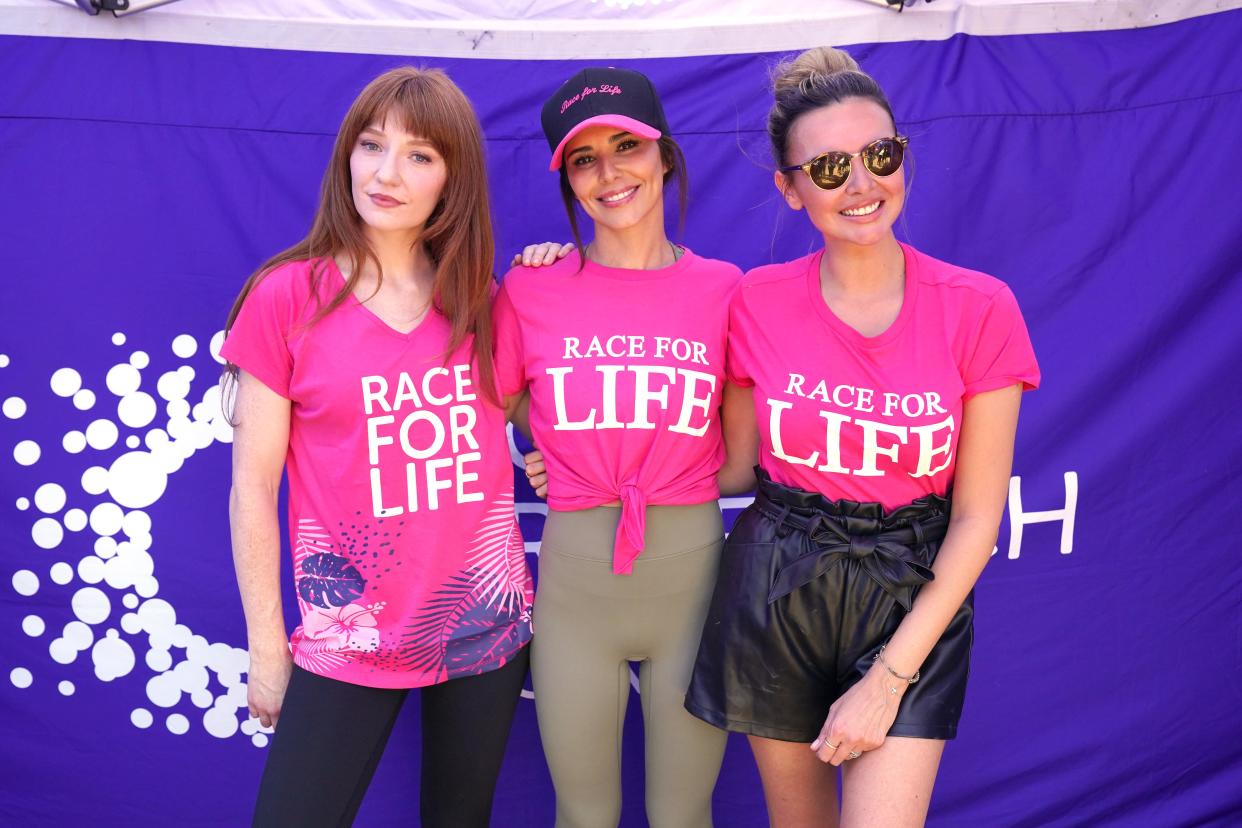 Former Girls Aloud band members (left to right) Nicola Roberts, Cheryl and Nadine Coyle take part in Race for Life for Sarah' at Hyde Park, London with Kimberley Walsh walking the 5k remotely. Picture date: Sunday July 24, 2022.