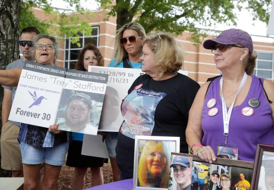 Paula Therrien talks to a group of family members and friends Monday at Moss Justice Center whose loved ones died of fentanyl overdoses.