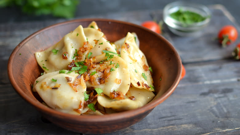 potato filled ravioli in wooden bowl