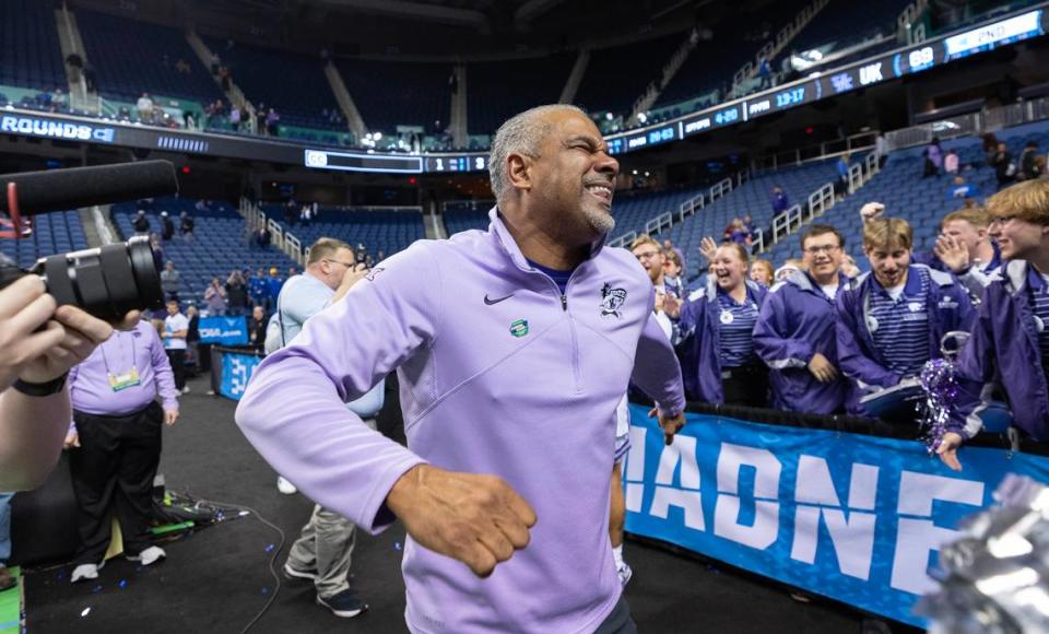 Kansas State coach Jerome Tang celebrates with the team’s cheerleaders after his team secured a spot in the Sweet 16 with a win over Kentucky in Greensboro, NC on Sunday.