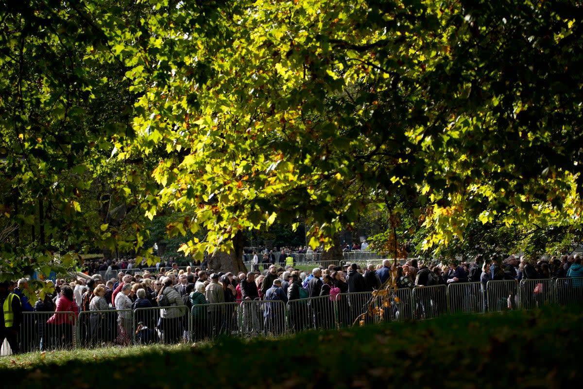 The queue now stretches out to almost five miles (AP)