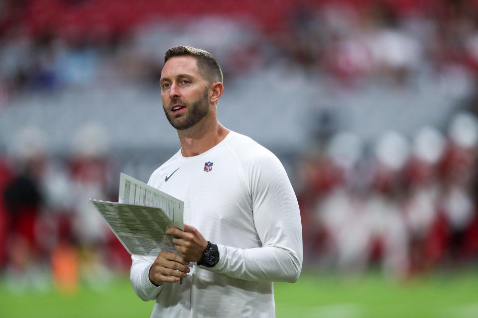 Arizona Cardinals head coach Kliff Kingsbury looks at fans during an open practice at State Farm Stadium on Saturday, August 6, 2022, in Glendale.