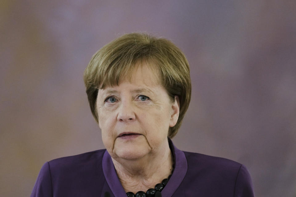 Former German Chancellor Angela Merkel speaks after she received the Grand Cross of the Order of Merit of the Federal Republic of Germany in a special design from German President Frank-Walter Steinmeier, during a reception at Bellevue Palace in Berlin, Germany, Monday, April 17, 2023. (AP Photo/Markus Schreiber)