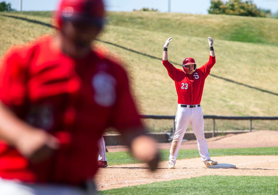 Springfield's Jack Swaney (23) reacts after a triple scores two runs putting the Senators up 6-4 over Burbank St. Laurence in the eighth inning during the Class 3A State Tournament semifinals at Wintrust Field in Schaumburg, Ill., Thursday, June 17, 2021. [Justin L. Fowler/The State Journal-Register] 