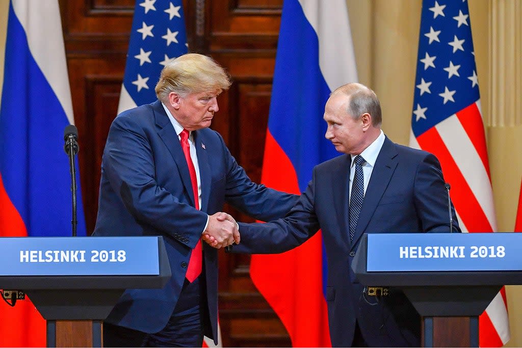 Donald Trump and Vladimir Putin in 2018  (AFP)