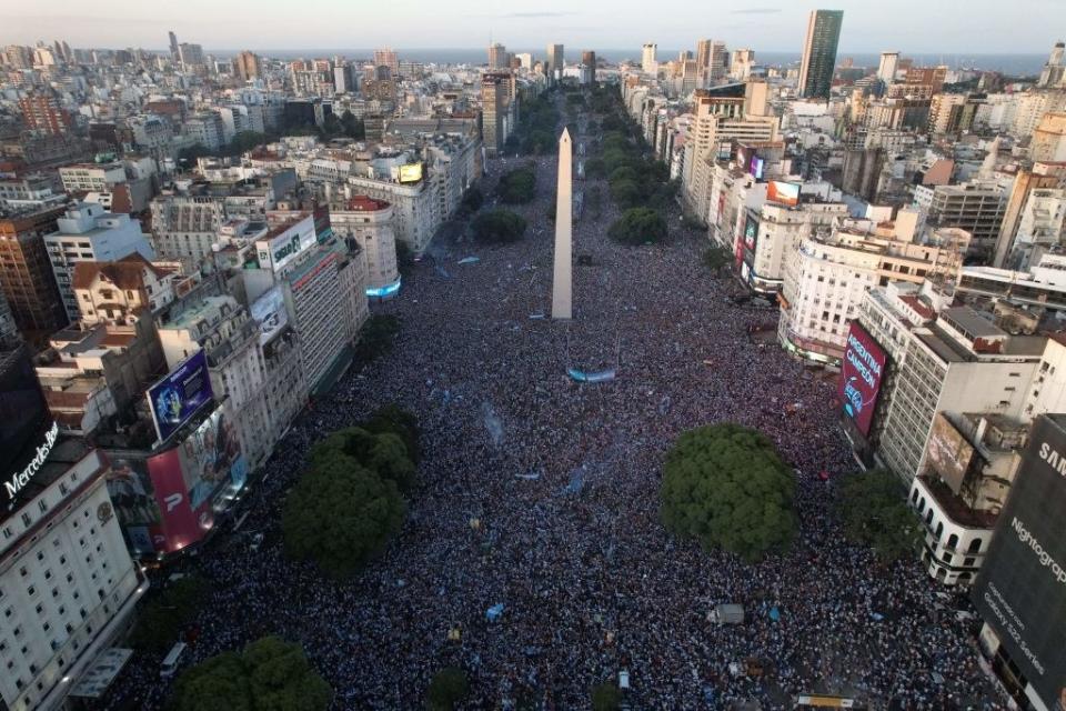 A packed open thoroughfare of a city