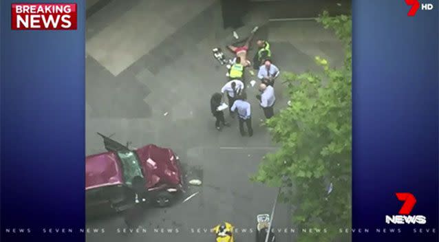 A man has been arrested after reportedly driving a vehicle in Melbourne's CBD, which struck a number of pedestrians. Picture: 7 News