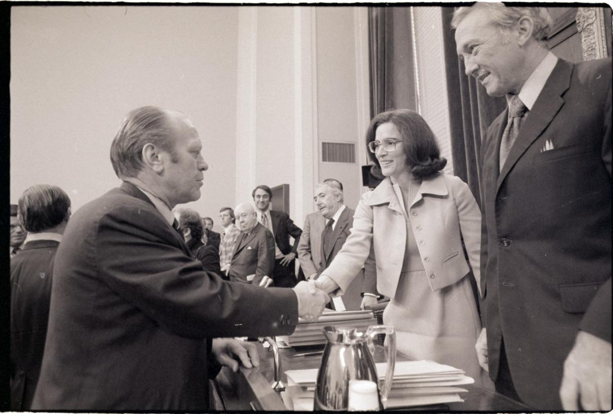 President Gerald Ford shakes hands with Rep. Elizabeth Holtzman, D-N.Y., after his testimony to the House Judiciary Committee in 1974 on his reasons for granting a pardon to former President Richard Nixon.