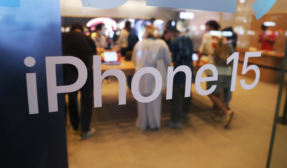 Customers are experiencing the newly launched iPhone 15 at Apple's flagship store in Shanghai, China, on September 24, 2023. (Photo by Costfoto/NurPhoto via Getty Images)