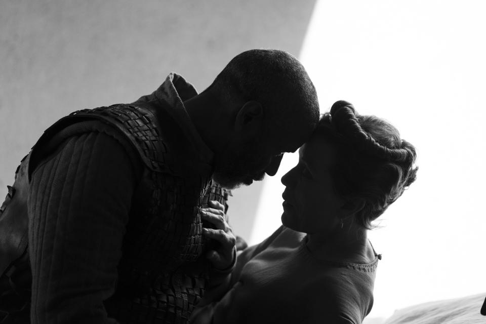 This image released by A24 shows Denzel Washington, left, and Frances McDormand in "The Tragedy oof Macbeth." (A24 via AP)