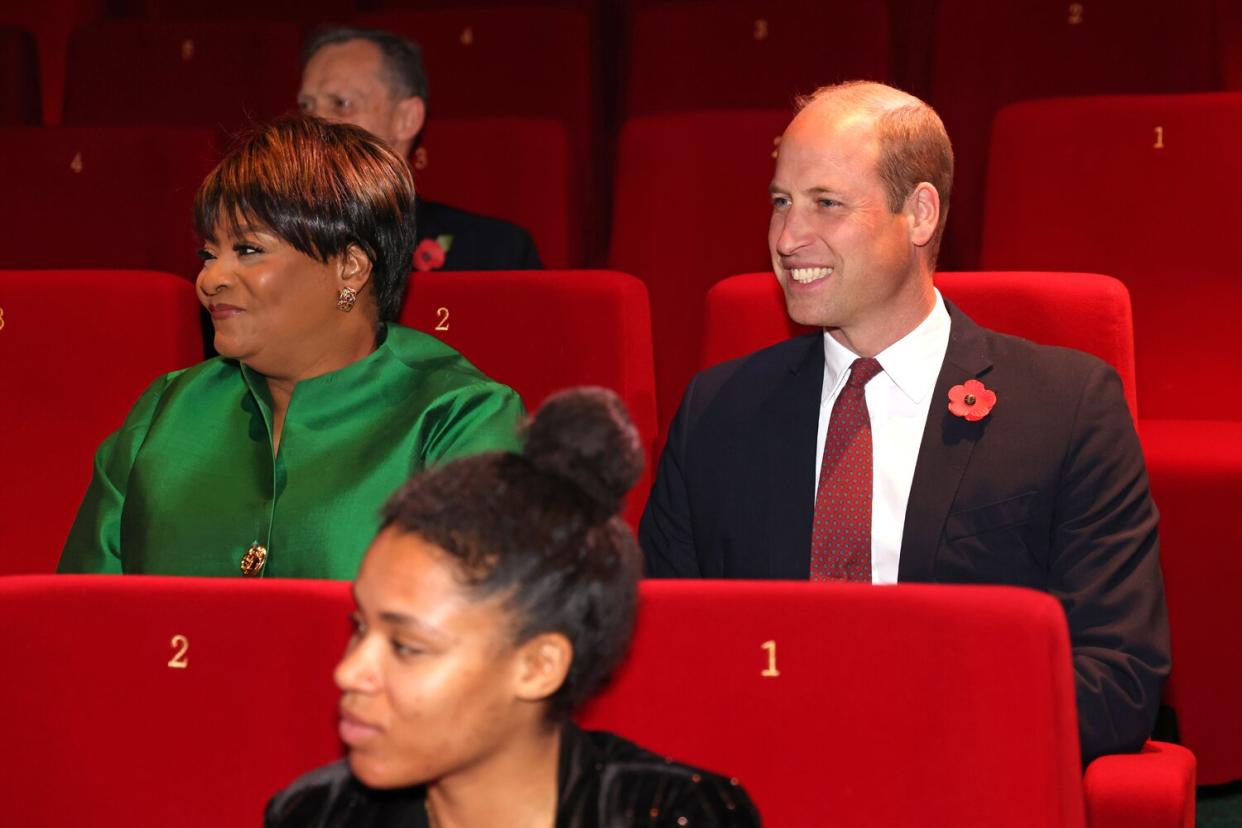 Arunma Oteh and Prince William, Prince of Wales smile during the Royal Africa Society Film Festival