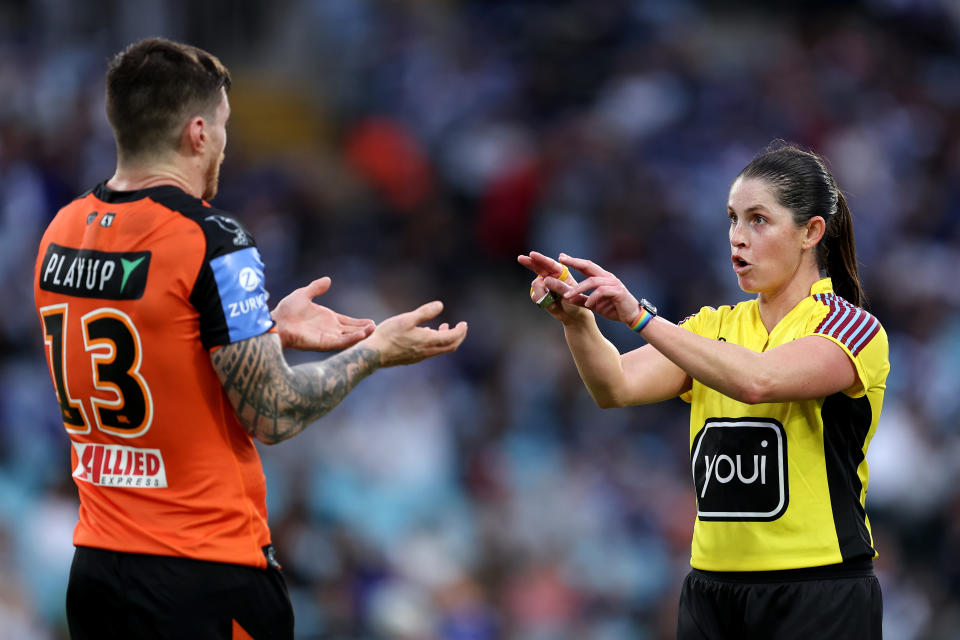 SYDNEY, AUSTRALIA - MAY 04: Referee, Kasey Badger speaks with John Bateman of the Tigers during the round nine NRL match between Canterbury Bulldogs and Wests Tigers at Accor Stadium, on May 04, 2024, in Sydney, Australia. (Photo by Brendon Thorne/Getty Images)