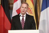 United States Secretary of Defense Patrick Shanahan talks to the media at a meeting of ministers of Defense during the International Security Conference in Munich, Germany, Friday, Feb. 15, 2019. (Tobias Hase/dpa via AP)