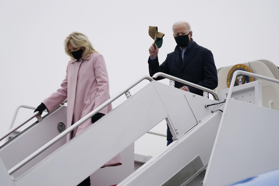 President Joe Biden and first lady Jill Biden arrive at Andrews Air Force Base after spending the weekend at Camp David, Monday, Feb. 15, 2021, in Andrews Air Force Base, Md. (AP Photo/Evan Vucci)