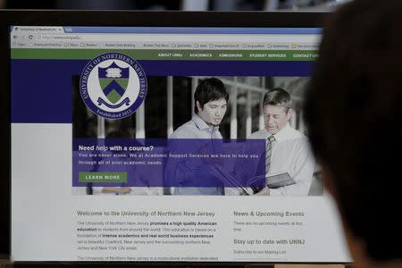 The website for University of Northern New Jersey, a phony university set up by U.S. authorities to lure criminals who defraud the country's Student and Exchange Visitor Program, is seen on a screen in New York April 5, 2016. REUTERS/Brendan McDermid