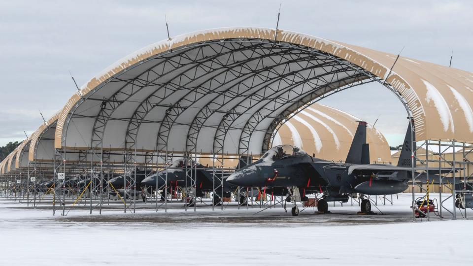 A look at the kind of open canvas-topped shelters in use on the flight line at Seymour Johnson now (seen here after a snowstorm in 2022).<em> USAF</em>