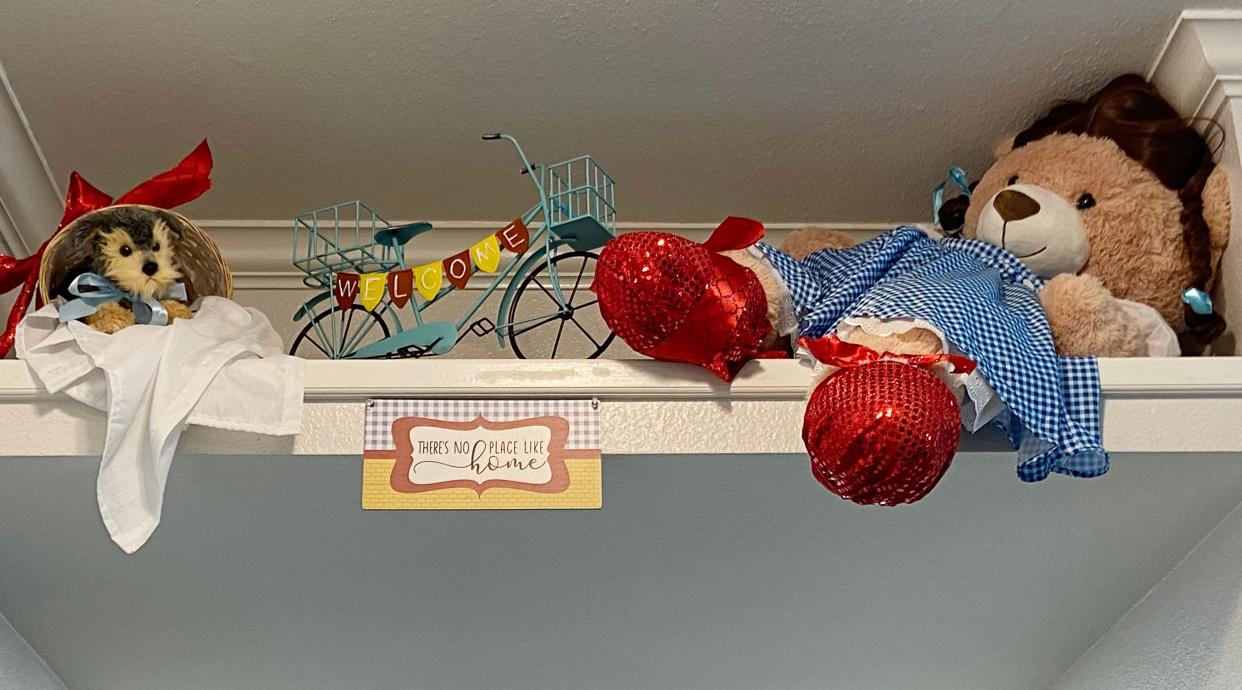 Toto, a bicycle and a stuffed bear dressed as "Wizard of Oz" character Dorothy Gale were featured recently in an alcove at Brookdale Shawnee assisted living center, where residents and staff commemorated the one-year anniversary of a tornado that struck the center and portions of Shawnee.