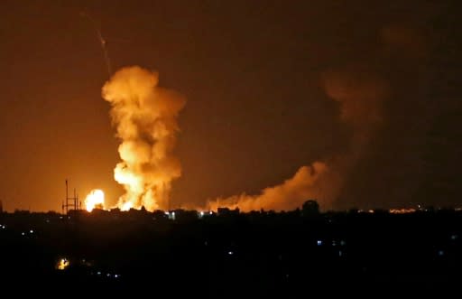 An explosion flare into the sky from an Israeli bombardment in Khan Yunis in the southern Gaza Strip on July 20, 2018