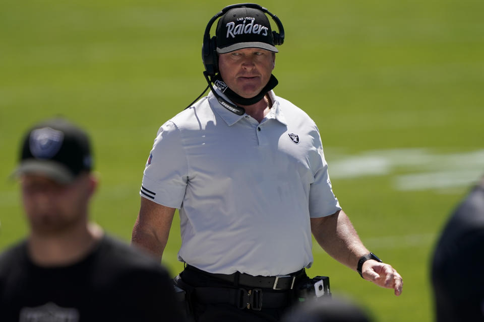 File-Las Vegas Raiders head coach Jon Gruden watches during the first half of an NFL football game against the Carolina Panthers Sunday, Sept. 13, 2020, in Charlotte, N.C. Gruden says opening this season at Carolina and then playing New Orleans on made him feel like he was time warp. His nostalgia is even more amplified this week against New England. It’s been nearly two decades since he walked out of a snow-covered Foxboro Stadium on the wrong end of a 16-13 overtime loss to the Patriots in the infamous “tuck rule” game during the 2001 playoffs. (AP Photo/Brian Blanco, File)