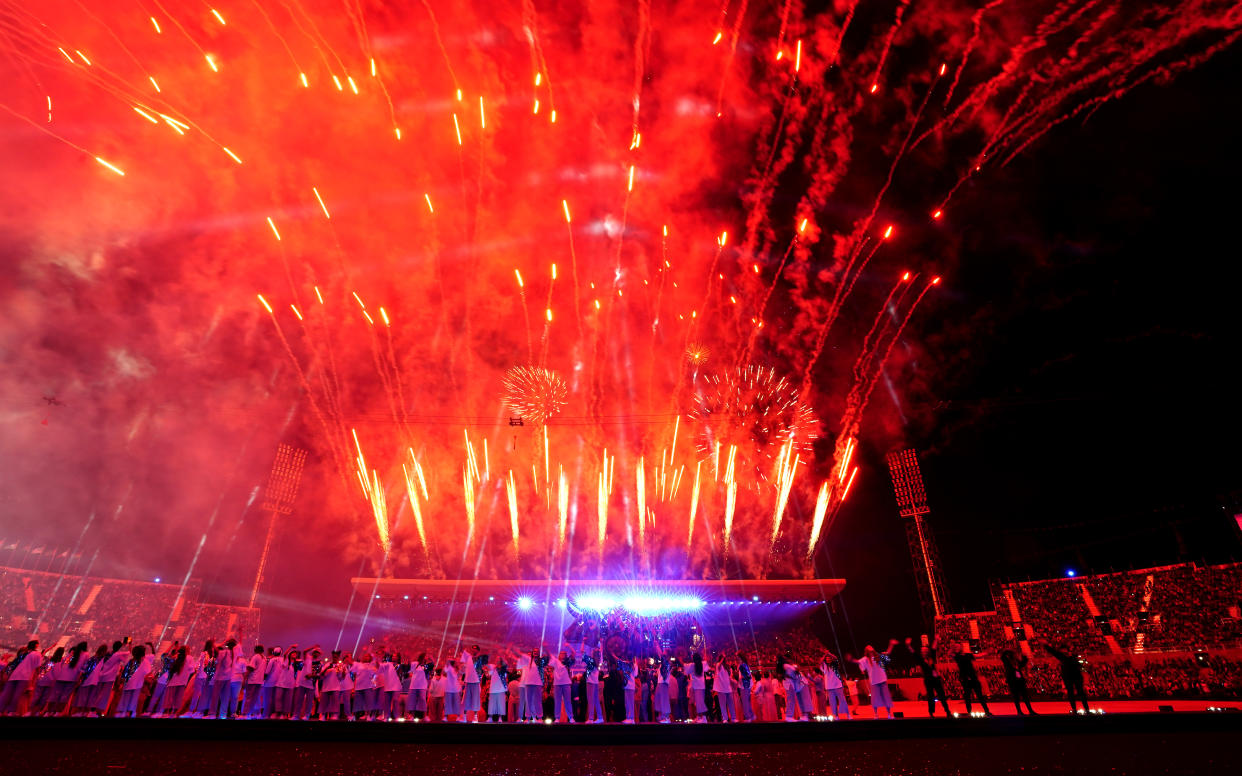 Performers and spectators look on as fireworks are set off during the opening ceremony of the Birmingham 2022 Commonwealth Games at the Alexander Stadium, Birmingham. Picture date: Thursday July 28, 2022.