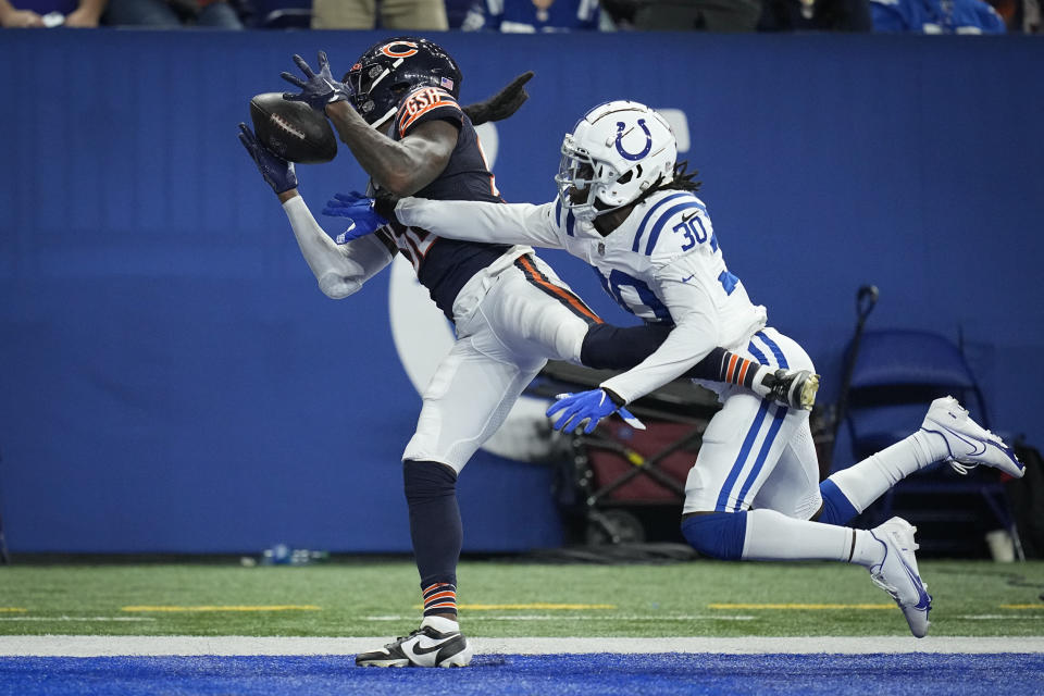 Chicago Bears wide receiver Daurice Fountain, left, makes a touchdown reception in front of Indianapolis Colts cornerback Darius Rush during the second half of an NFL preseason football game in Indianapolis, Saturday, Aug. 19, 2023. (AP Photo/Darron Cummings)