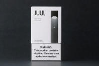 An electronic cigarette device made by JUUL is shown in this picture illustration taken September 14, 2018. REUTERS/Mike Blake/Illustration