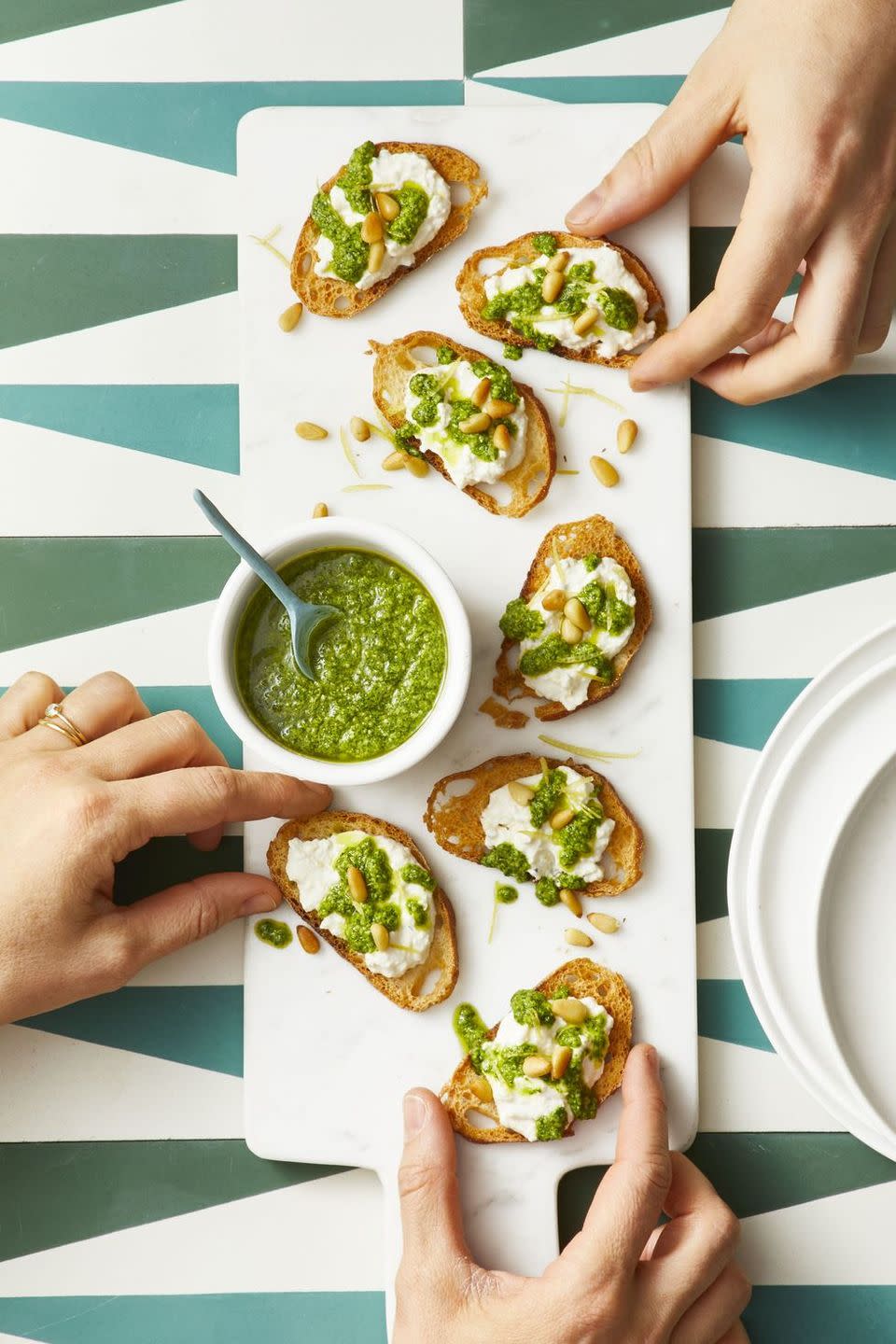 <p>A brilliant Emerald green hue makes arugula pesto a natural pick for St. Patrick's Day.</p><p>Get the <strong><a href="https://www.goodhousekeeping.com/food-recipes/easy/a19865763/arugula-pesto-recipe/" rel="nofollow noopener" target="_blank" data-ylk="slk:Arugula Pesto recipe;elm:context_link;itc:0;sec:content-canvas" class="link ">Arugula Pesto recipe</a></strong>. </p>