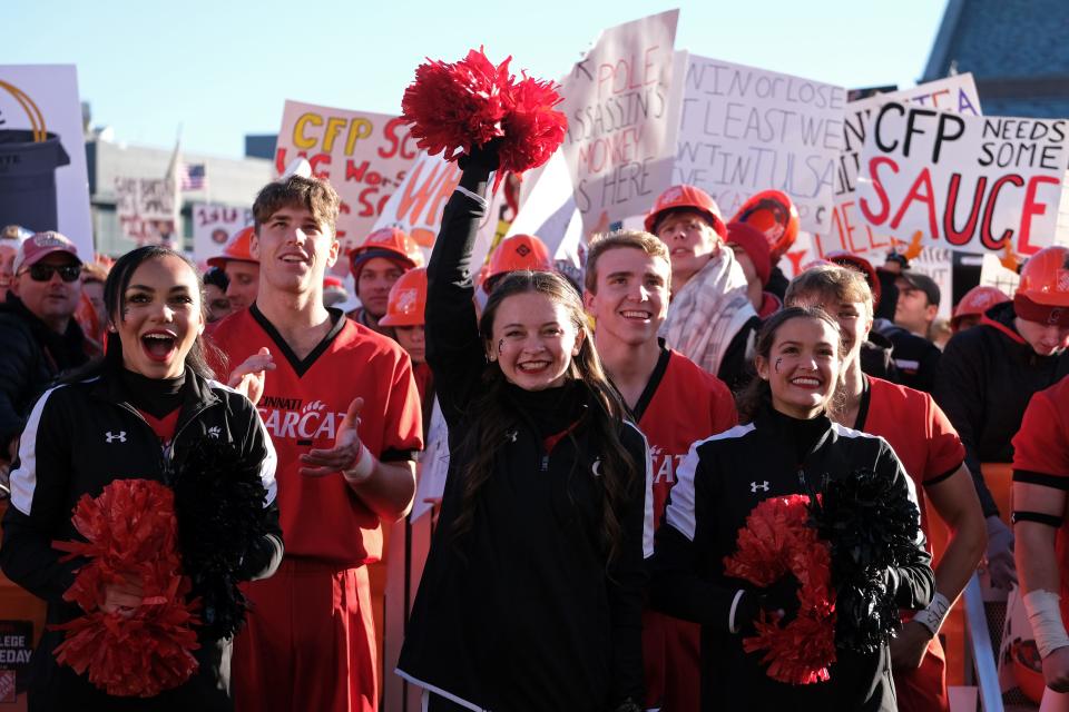 University of Cincinnati cheerleaders lead a cheer during ESPN's 'College GameDay' broadcast during their first appearance at the UC  before the Bearcats face the University of Tulsa  Saturday, Nov. 6, 2021.