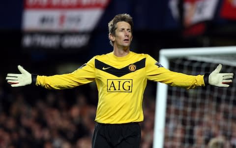 Manchester United's Edwin Van der Sar gestures towards an assistant referee during their English Premier League soccer match against Chelsea at the Stamford Bridge Stadium, London, Sunday Nov. 8, 200 - Credit: AP