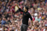 Arsenal's manager Mikel Arteta shouts out as gives instructions from the side line during the English Premier League soccer match between Arsenal and Tottenham Hotspur, at Emirates Stadium, in London, England, Saturday, Oct. 1, 2022. (AP Photo/Kirsty Wigglesworth)