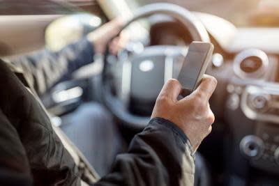 A law that makes it illegal to use a phone while driving without a hands-free device went into effect in Tennessee on July 1, 2019.