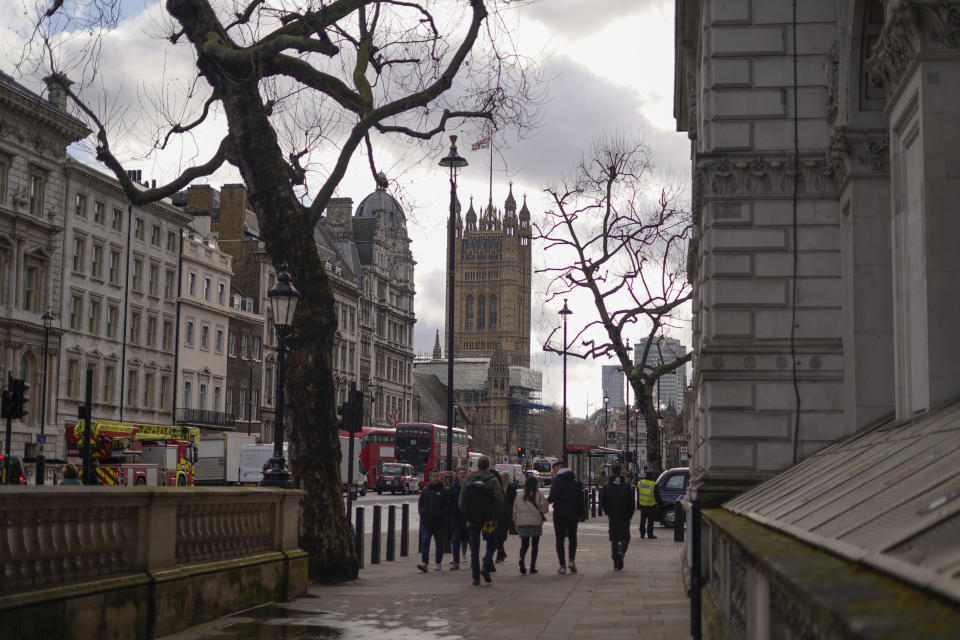 The Victoria Tower stands in Westminster, in London, Friday, Feb. 4, 2022. Four of Boris Johnson's most senior staff quit on Thursday, with a fifth staff member resigning on Friday morning, triggering new turmoil for the embattled British prime minister. Johnson's grip on power has been shaken by revelations that his staff held "bring your own booze" office parties, birthday celebrations and "wine time Fridays" in 2020 and 2021 while millions in Britain were barred from meeting with friends and family during coronavirus lockdowns. (AP Photo/Alberto Pezzali)