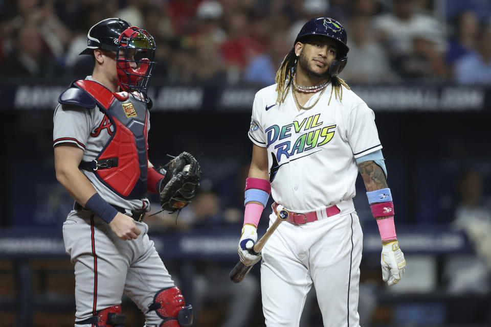 Tampa Bay Rays' Jose Siri, right, reacts after striking out next to Atlanta Braves catcher Sean Murphy during the fifth inning of a baseball game Friday, July 7, 2023, in St. Petersburg, Fla. (AP Photo/Mike Carlson)