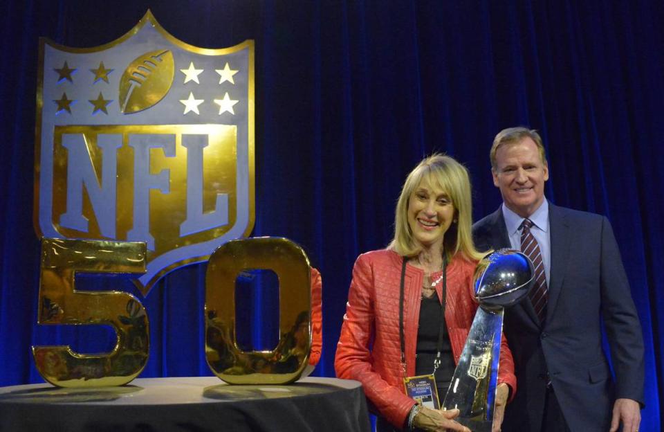 NFL commissioner Roger Goodell and Kansas City Chiefs owner Norma Hunt posed with the Lombardi Trophy at a news conference in advance of Super Bowl 50.