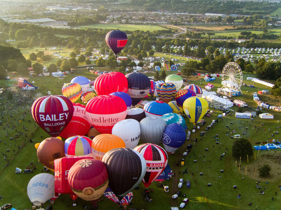 <p>The mass ascent of balloons at the Bristol International Balloon Fiesta. (Photo by Steve Parsons/PA Images via Getty Images) </p>