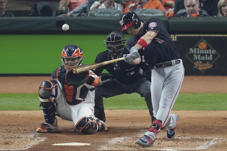 Washington Nationals' Ryan Zimmerman hits a home run during the second inning of Game 1 of the baseball World Series against the Houston Astros Tuesday, Oct. 22, 2019, in Houston. (AP Photo/Eric Gay)