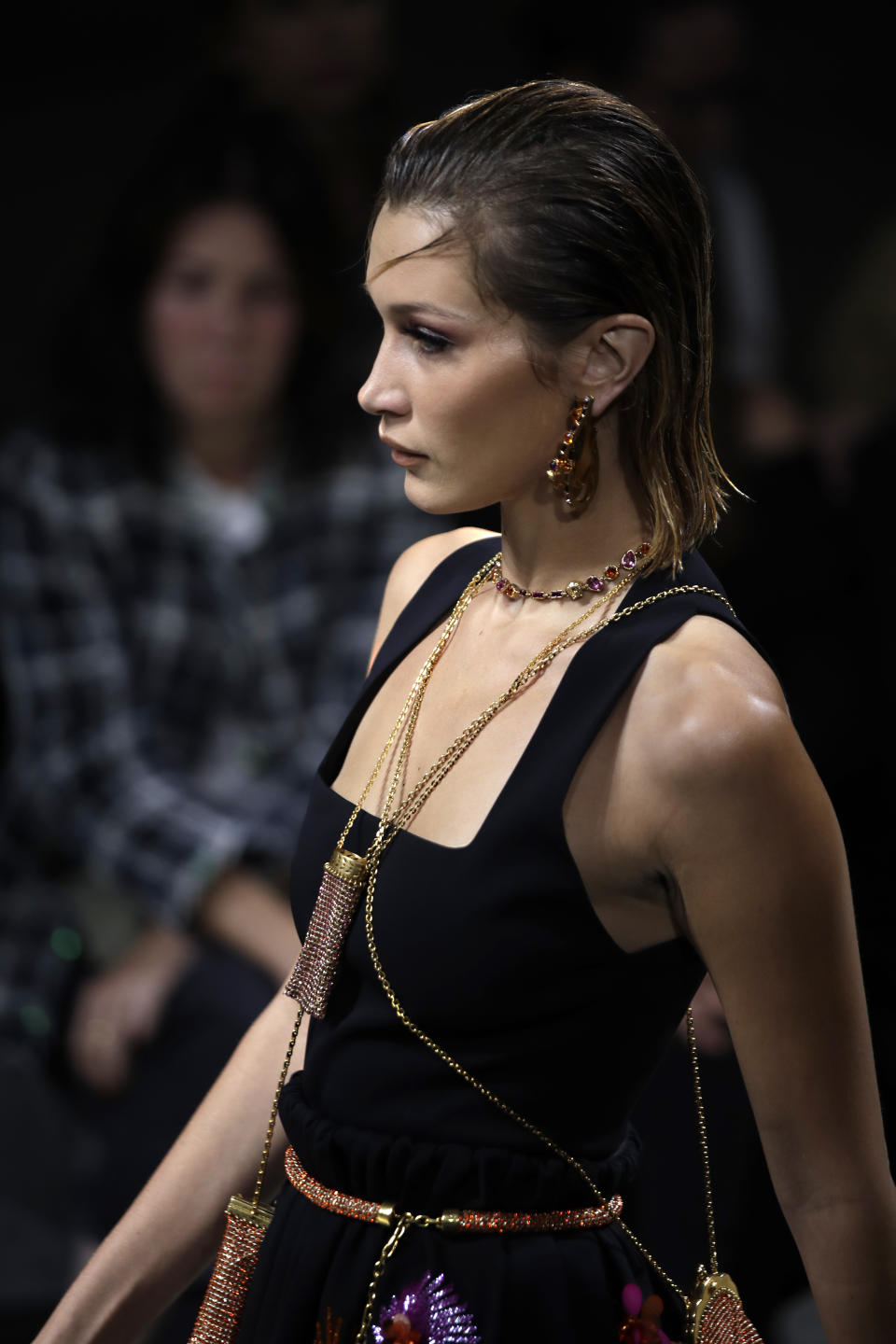 Model Bella Hadid wears a creation as part of the Versace Spring-Summer 2020 collection, unveiled during the fashion week, in Milan, Italy, Friday, Sept. 20, 2019. (AP Photo/Luca Bruno)