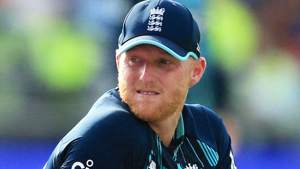 Ben Stokes is pictured kneeling while playing for England.