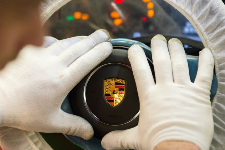 Two top Porsche executives and an ex-employee are being probed in connection with the "dieselgate" scandal