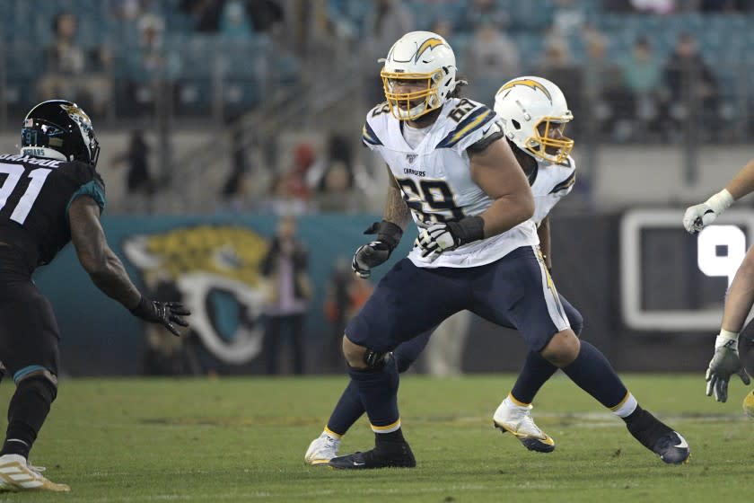 Los Angeles Chargers offensive tackle Sam Tevi (69) sets up to block in front of Jacksonville Jaguar.