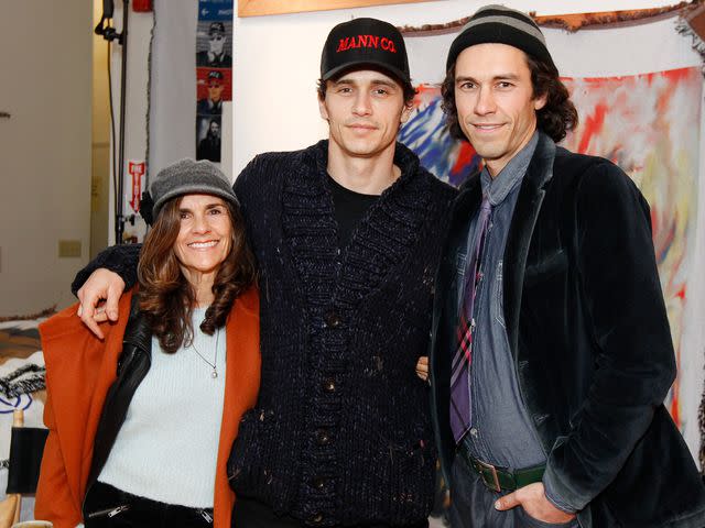 <p>Kimberly White/Getty</p> Betsy Lou Franco, mother of James and Tom Franco, at the Art of Elysium reception for Tom and James Franco's BRO-MANCE