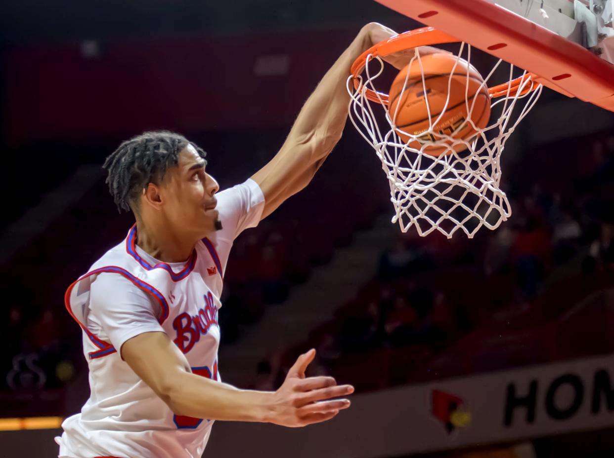 Bradley's Darius Hannah dunks over the Illinois State defense late in the second half Wednesday, Feb. 8, 2023 at CEFCU Arena in Normal. The Braves downed the Redbirds 79-61.