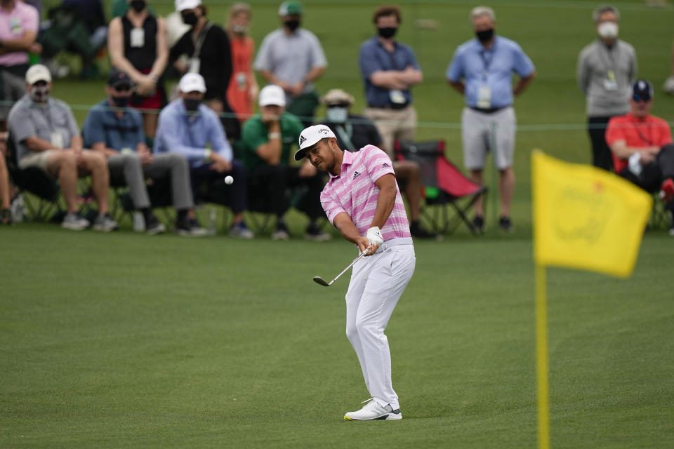 Xander Schauffele hits to the second green during the third round of the Masters golf tournament on Saturday, April 10, 2021, in Augusta, Ga. (AP Photo/David J. Phillip)