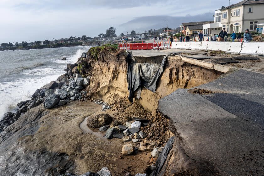 SANTA CRUZ, CALIFORNIA - JANUARY 8, 2023: A portion of West Cliff Drive fell into the Pacific Ocean after a series of powerful storms of rain and high winds hit Californias Central Coast in Santa Cruz, California on Sunday January 8, 2023. (Melina Mara/The Washington Post via Getty Images)